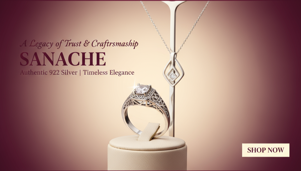 Silver ring and necklace on a beige stand with 'Sanache' branding against a gradient purple background.